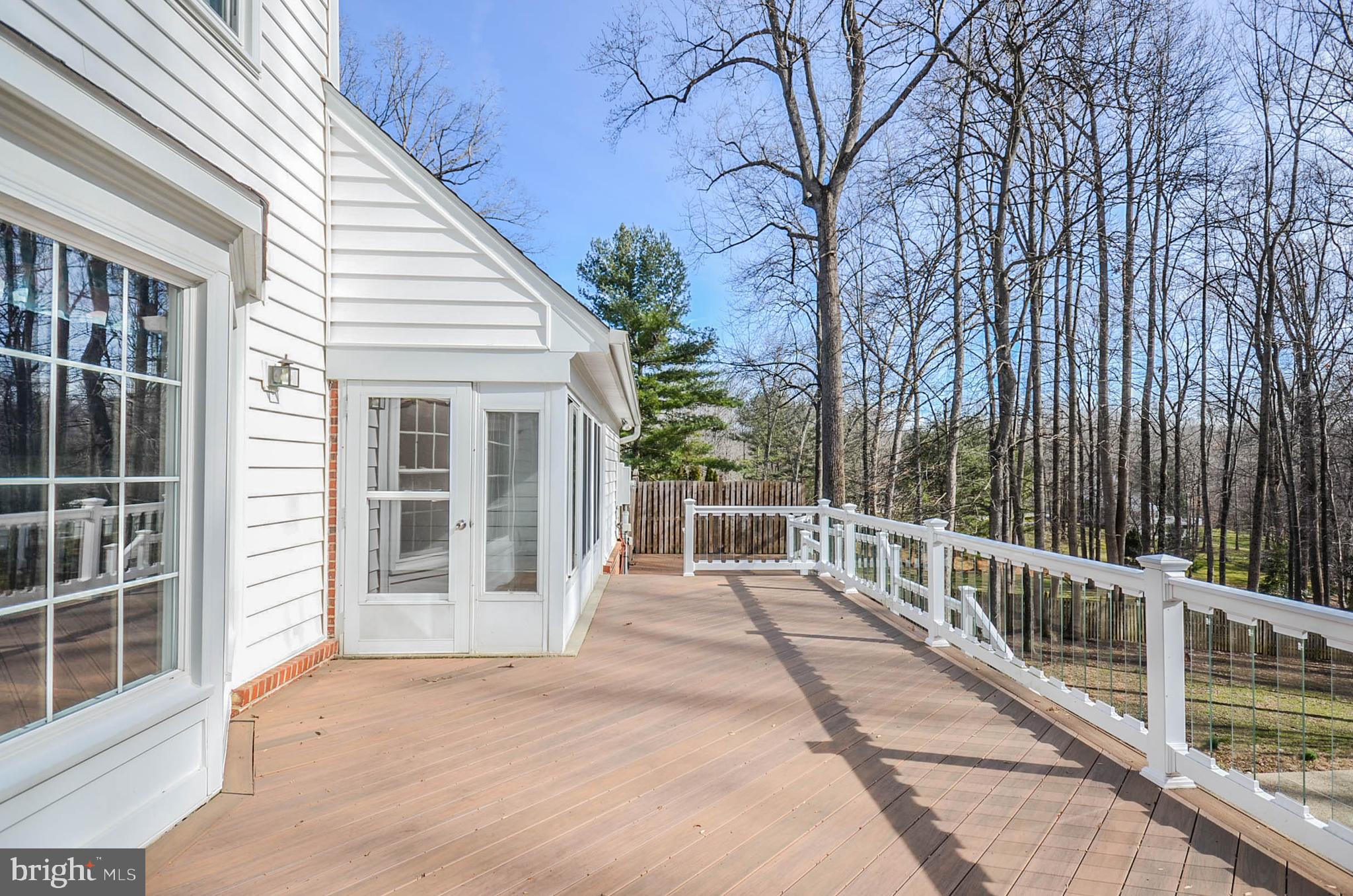 12009 Wetherfield Lane Potomac, MD 20854 - Photo 35 of 46 Railing allows enjoyment of deck with pool view