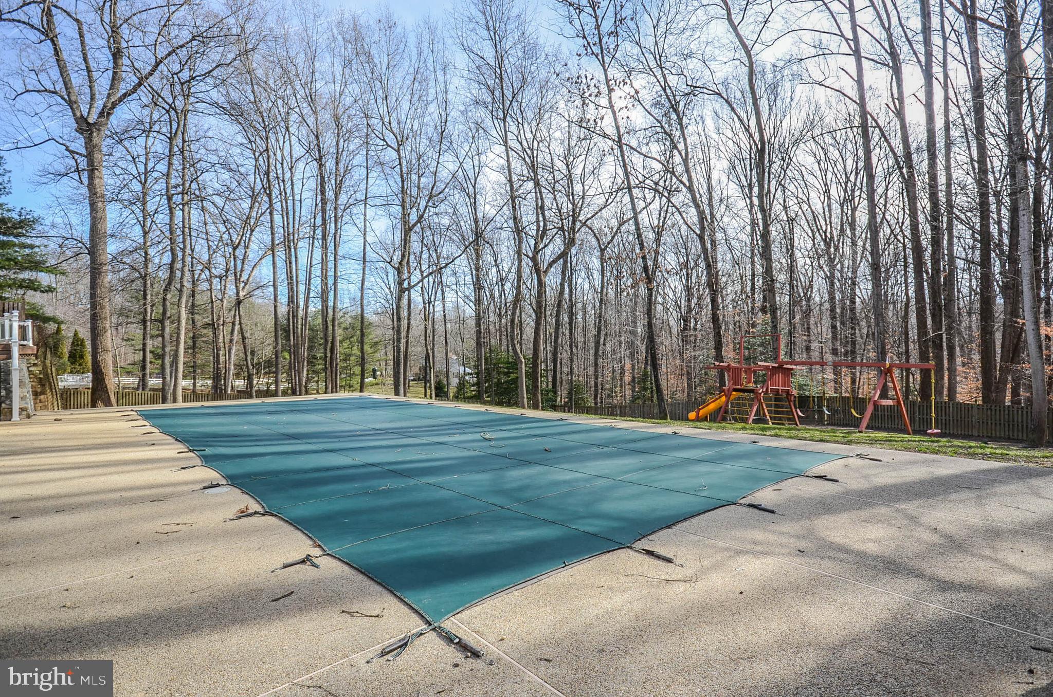 12009 Wetherfield Lane Potomac, MD 20854 - Photo 39 of 46 Gas heated pool with electronic retractable cover!