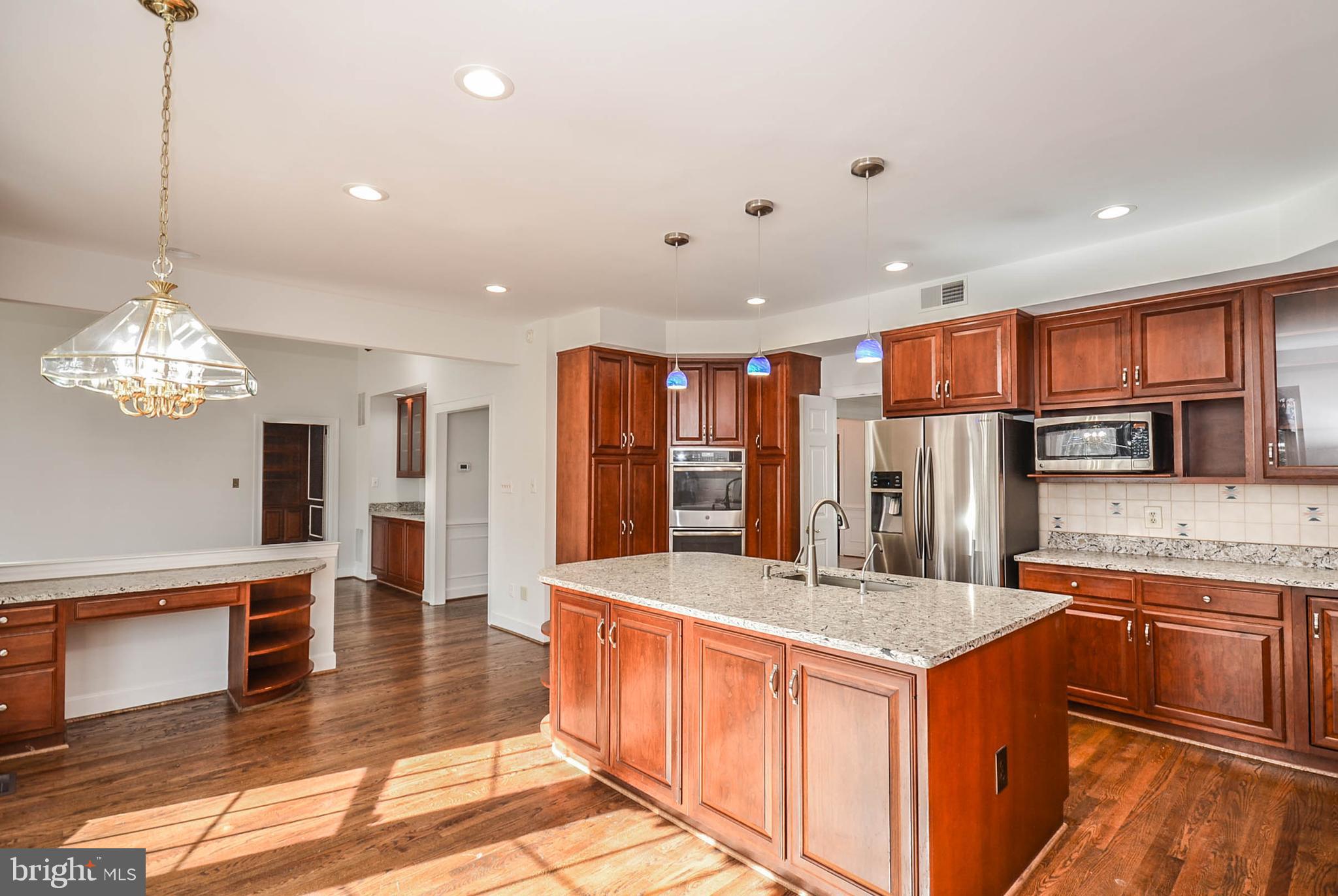 12009 Wetherfield Lane Potomac, MD 20854 - Photo 8 of 46 Quartz countertops