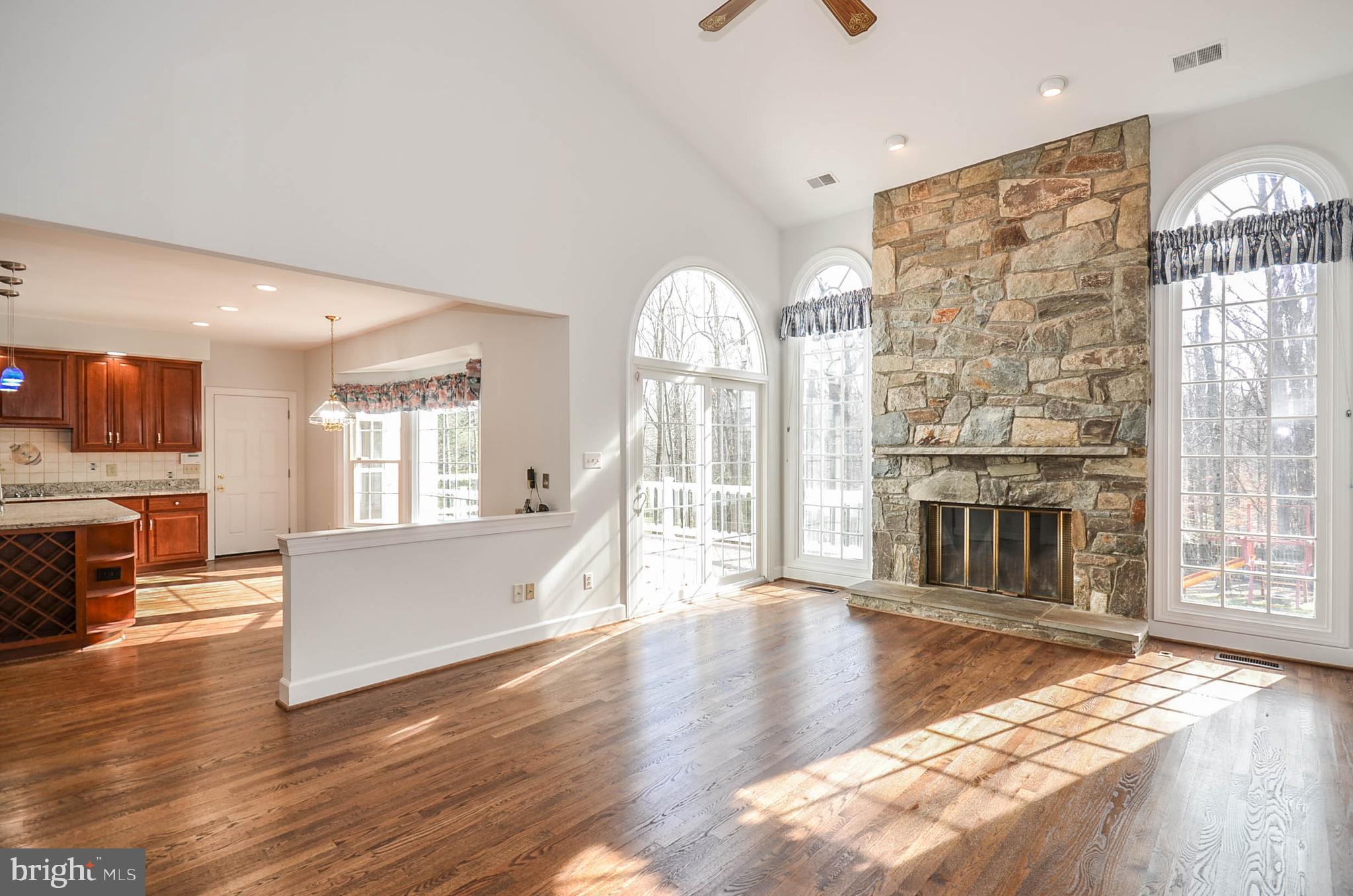 12009 Wetherfield Lane Potomac, MD 20854 - Photo 10 of 46 Kitchen opens to great room with high ceilings!