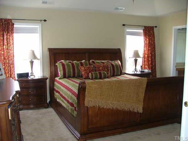 100 Cupp Court Raleigh, NC 27603 - Photo 7 of 10 Master bedroom suite has trey ceiling and ceiling fan. Other