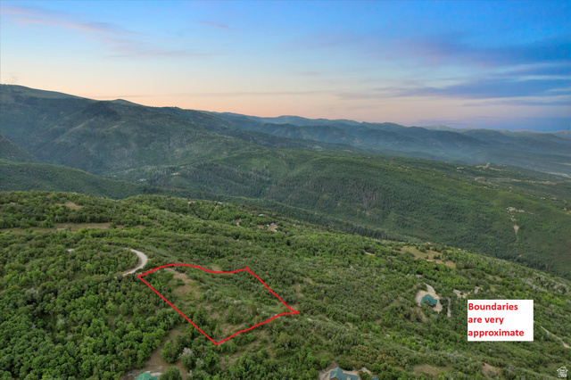 120 North Main Road East, Unit 120 Fairview, UT 84629 - Photo 4 of 9 Expansive undeveloped parcel set within a mountainous landscape