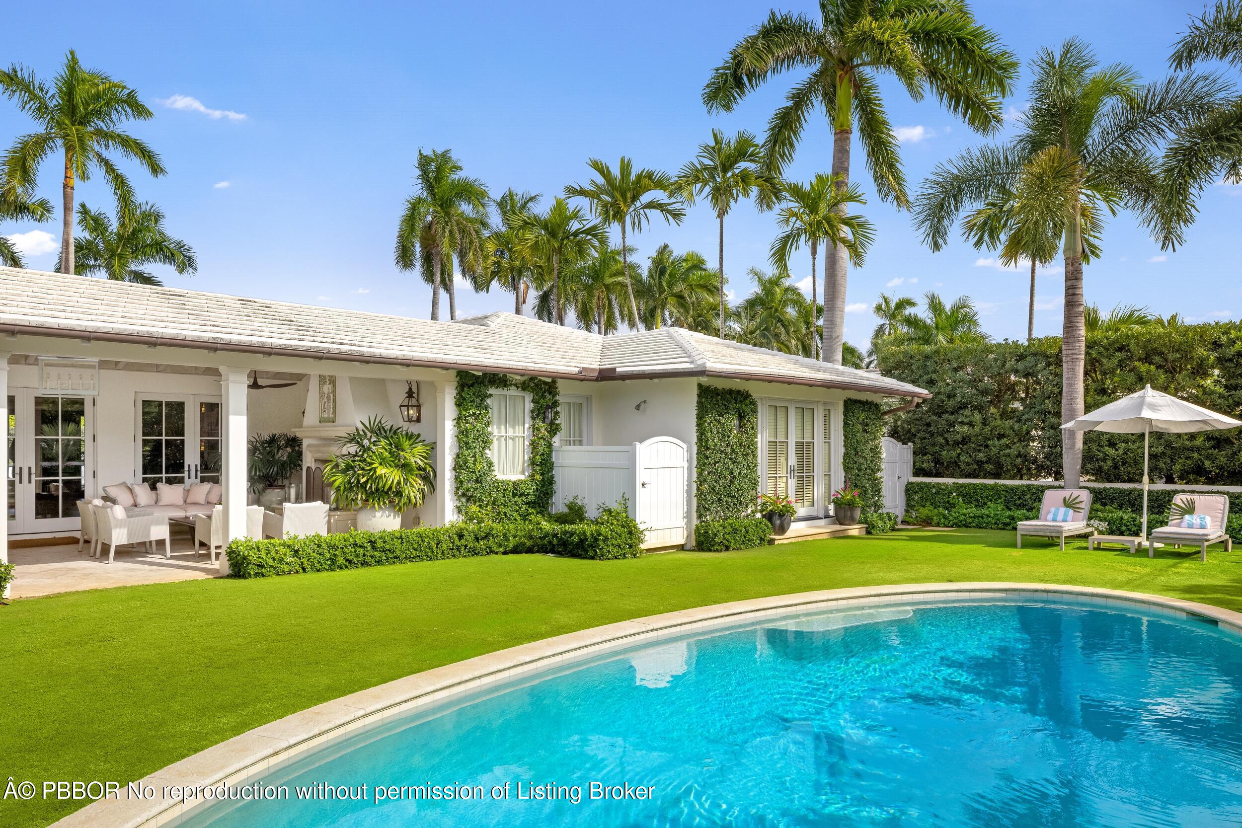 258 List Road Palm Beach, FL 33480 - Photo 2 of 45 a view of a house with swimming pool and sitting area