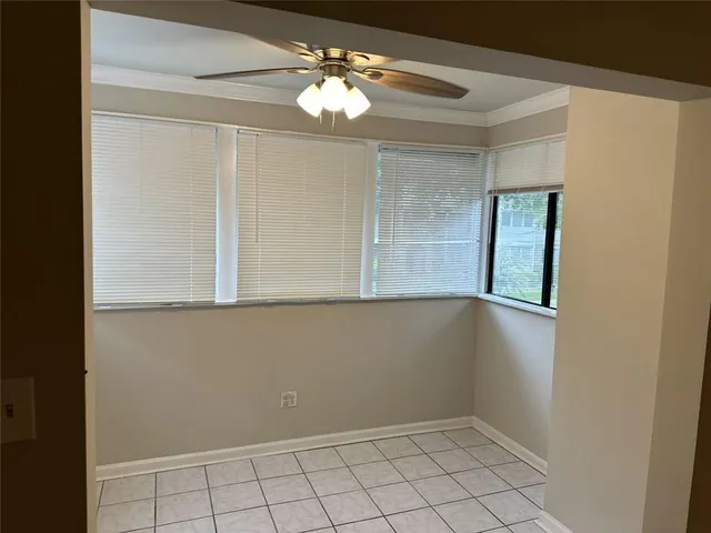 a view of a room that has a window in it