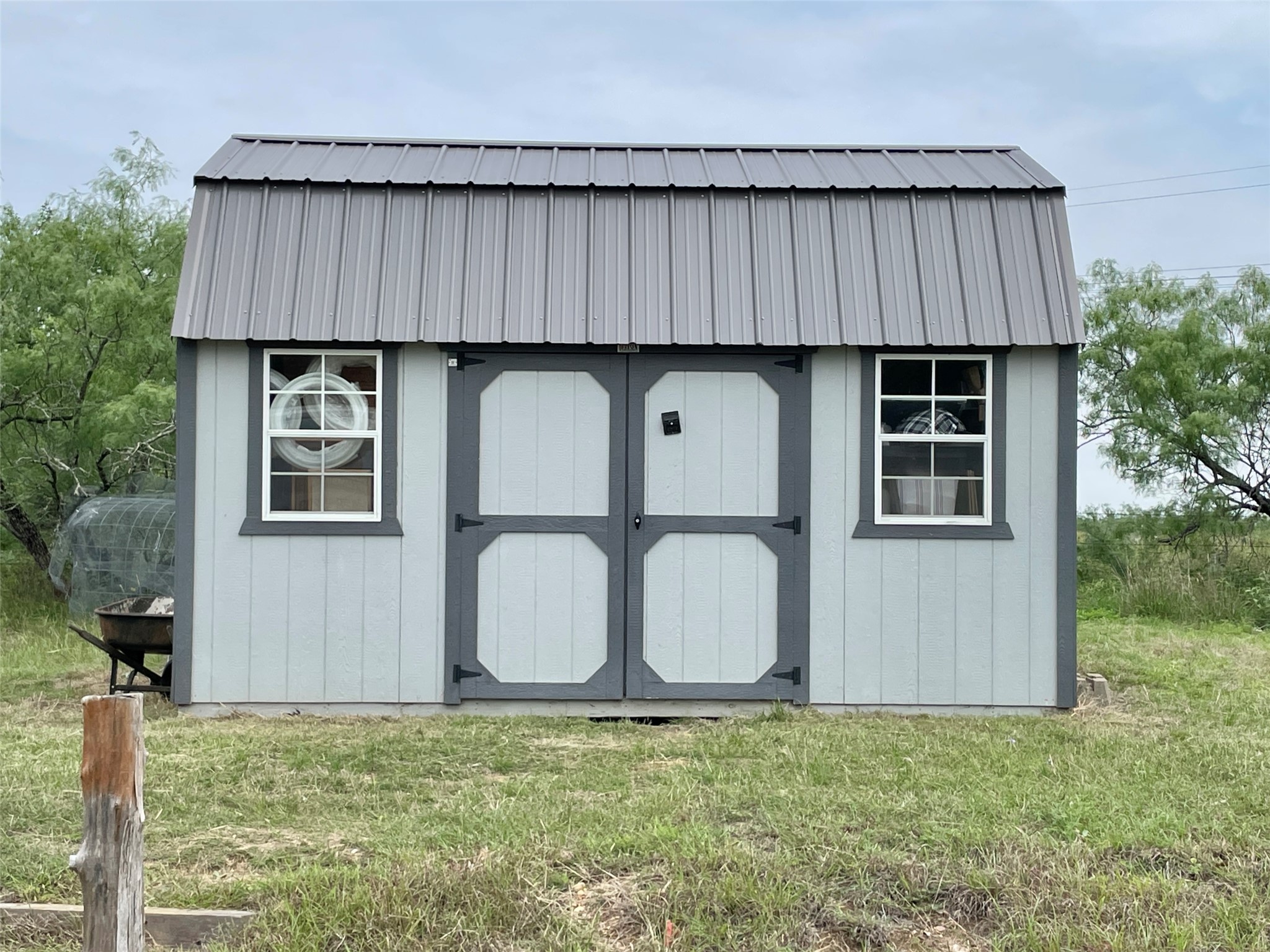 136 Fm 2239 Road Paige, TX 78659 - Photo 22 of 29 a backyard of a house with table and chairs