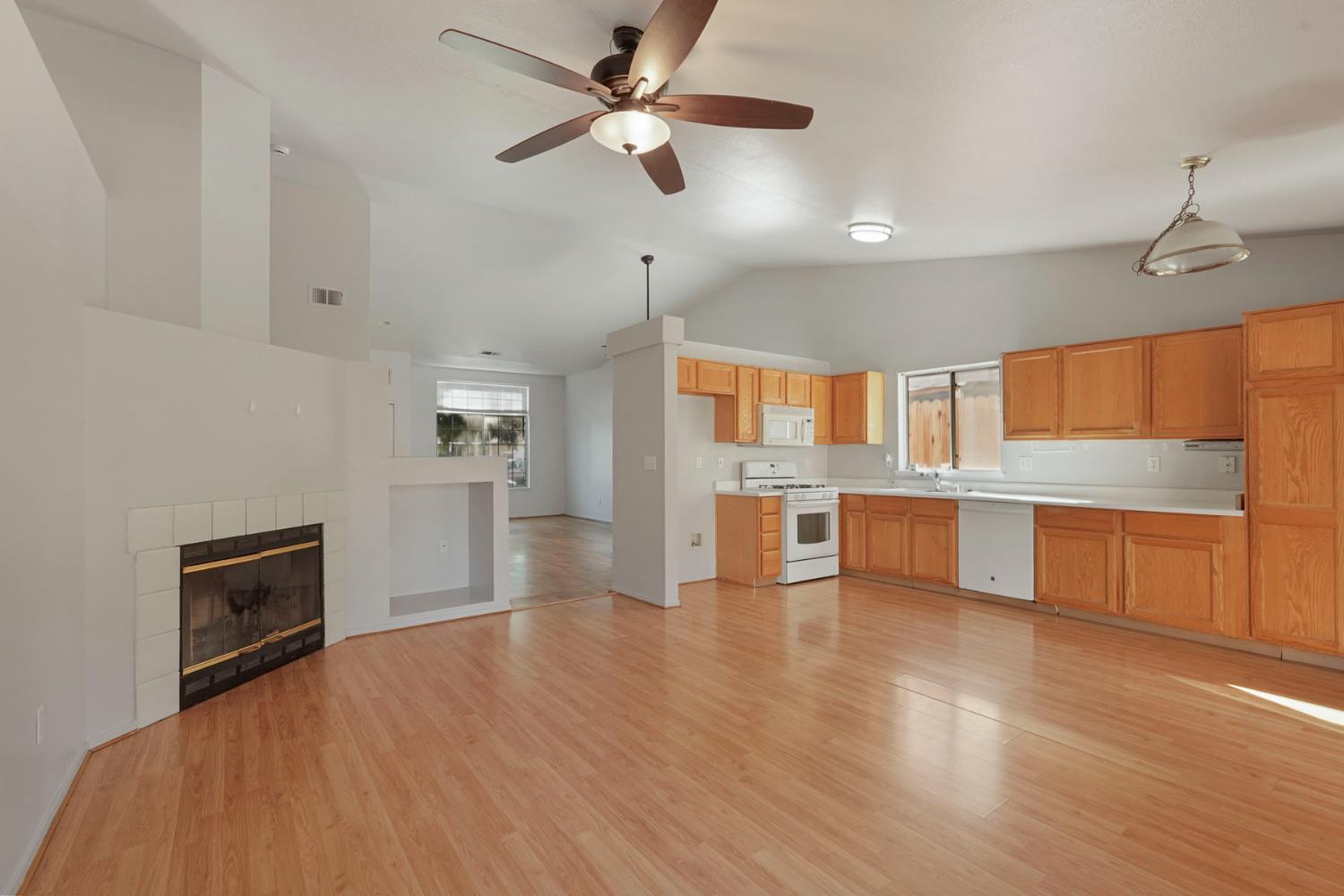 2449 Calvert Street Stockton, CA 95210 - Photo 17 of 37 a view of kitchen with microwave and wooden floor
