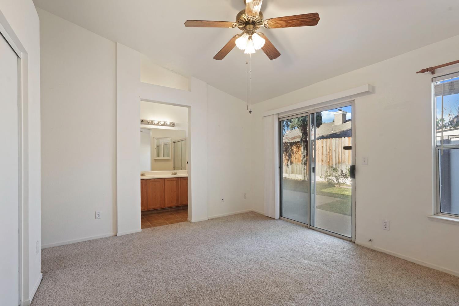 2449 Calvert Street Stockton, CA 95210 - Photo 28 of 37 an empty room with chandelier fan