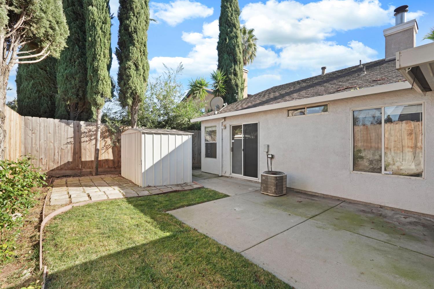 2449 Calvert Street Stockton, CA 95210 - Photo 37 of 37 a front view of a house with a yard