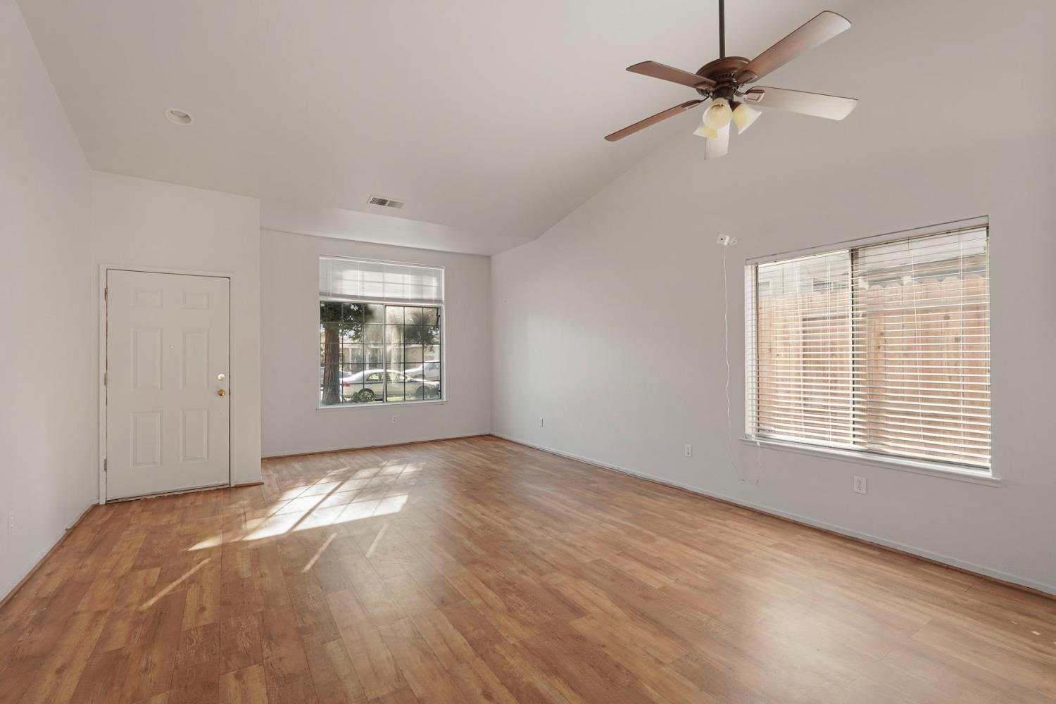 2449 Calvert Street Stockton, CA 95210 - Photo 7 of 37 a view of an empty room with a window