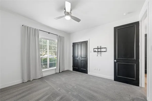 a spacious bathroom with a double vanity sink mirror and
