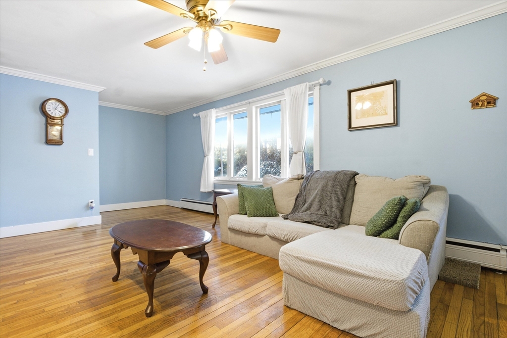 16 Worcester Road Townsend, MA 01469 - Photo 12 of 42 a living room with furniture and a window