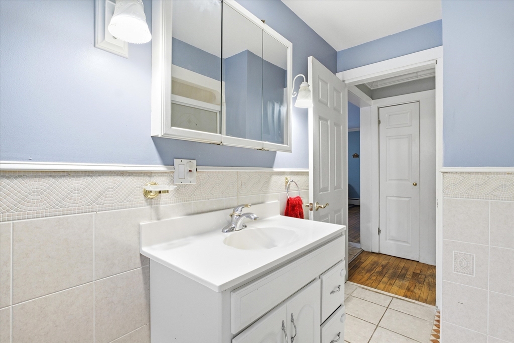 16 Worcester Road Townsend, MA 01469 - Photo 16 of 42 a bathroom with a sink and a mirror