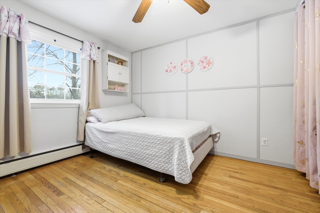 16 Worcester Road Townsend, MA 01469 - Photo 18 of 42 a bedroom with a bed and a window
