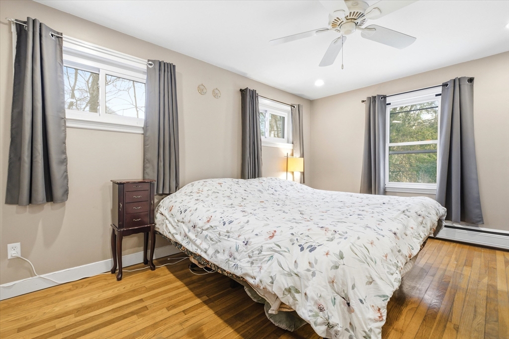16 Worcester Road Townsend, MA 01469 - Photo 23 of 42 a bedroom with a bed and a window