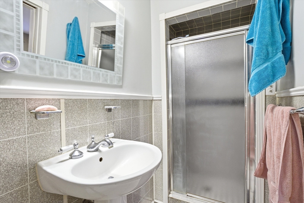 16 Worcester Road Townsend, MA 01469 - Photo 26 of 42 a bathroom with a sink and mirror