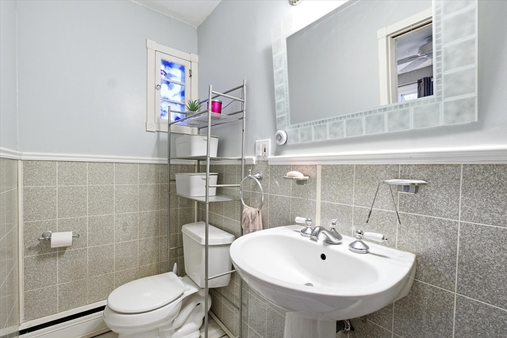 16 Worcester Road Townsend, MA 01469 - Photo 27 of 42 a bathroom with a sink a toilet and a mirror