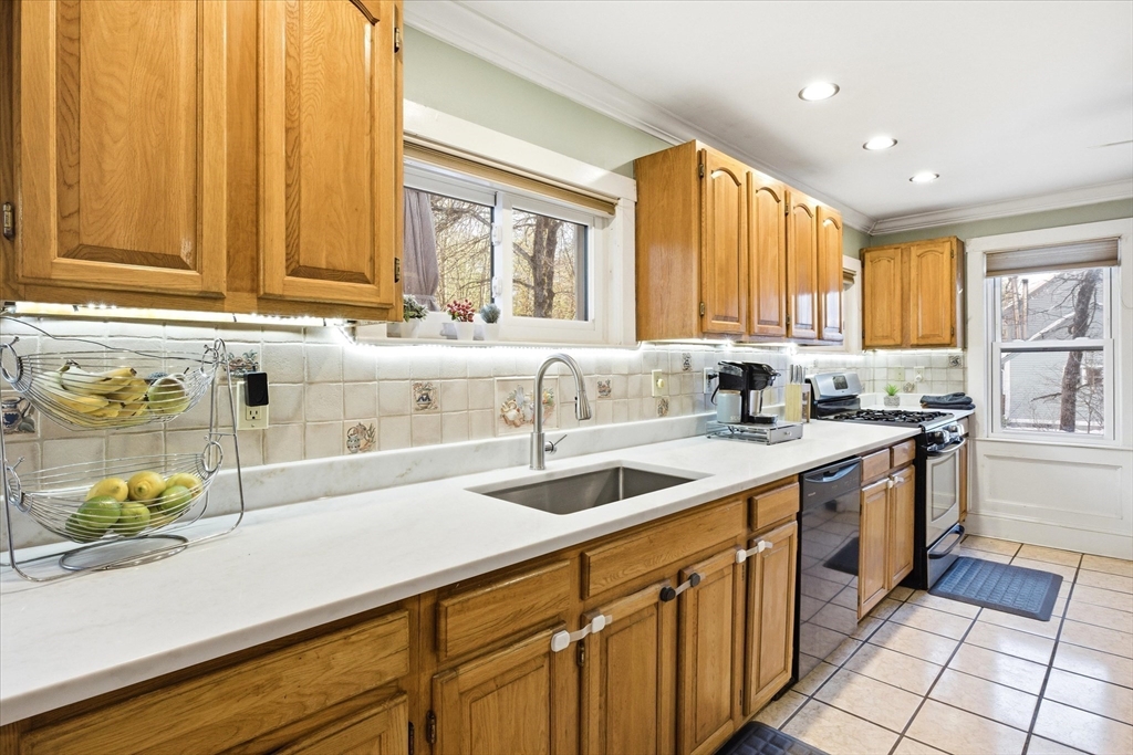 16 Worcester Road Townsend, MA 01469 - Photo 5 of 42 a kitchen with stainless steel appliances granite countertop a sink and a white cabinets