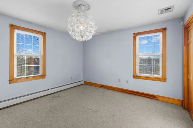a bathroom with a sink a vanity and a toilet
