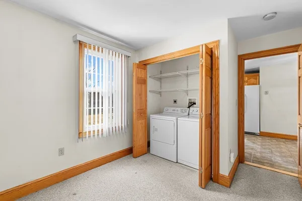 wooden floor in an empty room and a window