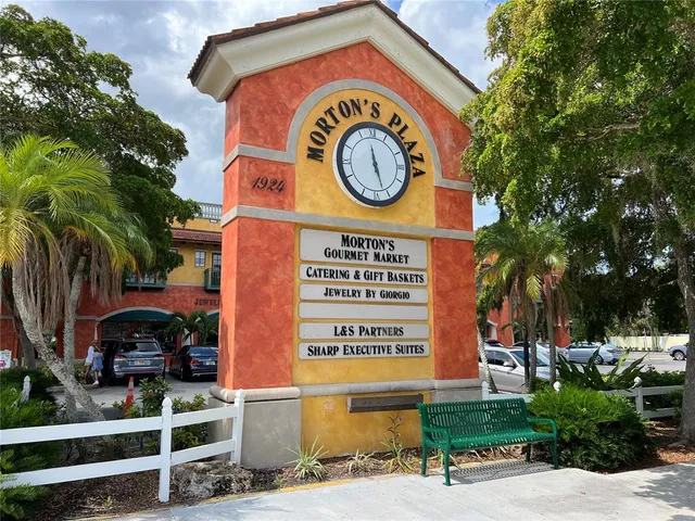 a sign on a pole on a street