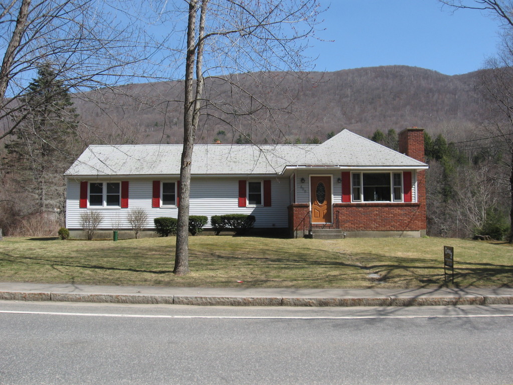 600 River Road Clarksburg, MA 01247 - Photo 2 of 20 a front view of a house with a yard