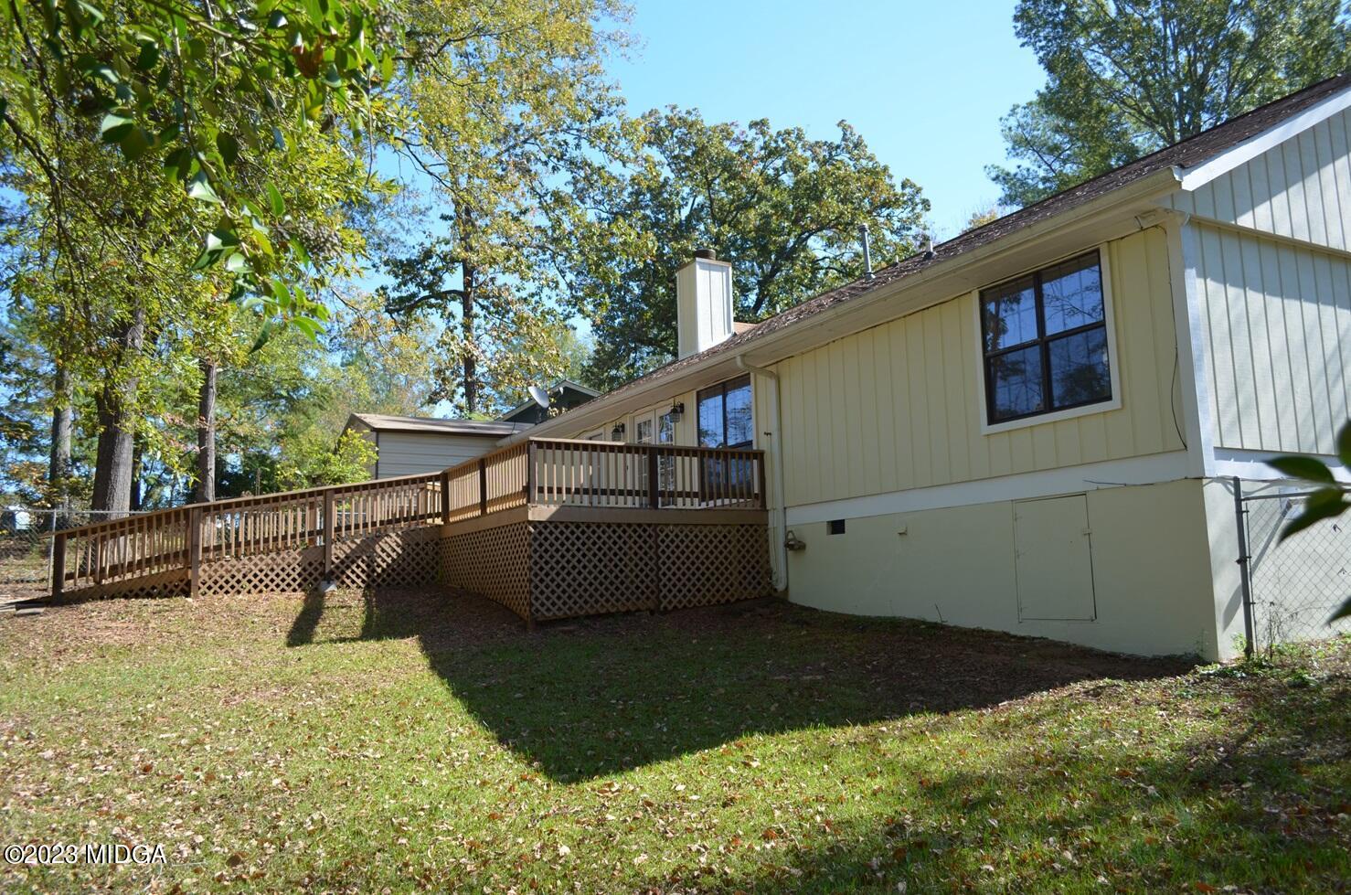1157 Ridgeview Circle Macon, GA 31220 - Photo 17 of 20 a view of house with trees in the background