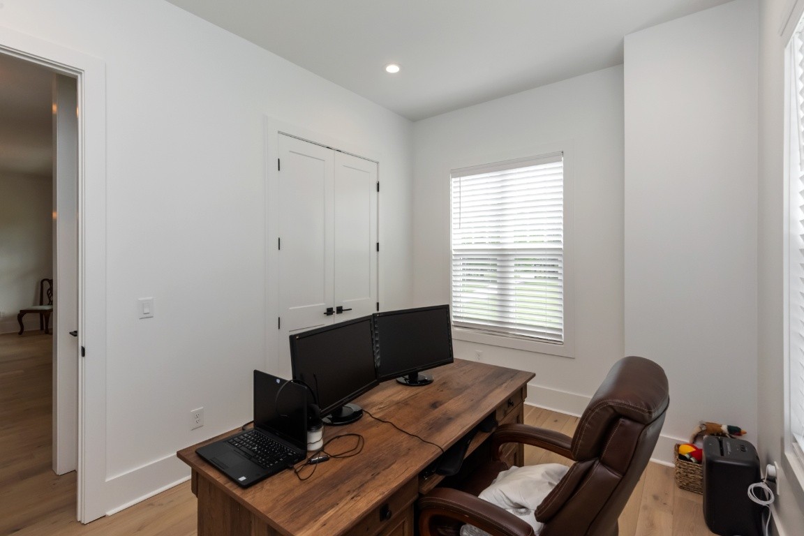 6926 Cairo Bend Road Lebanon, TN 37087 - Photo 16 of 42 a view of a workspace with furniture and a window