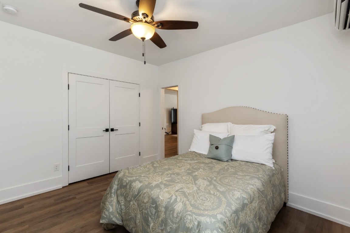 6926 Cairo Bend Road Lebanon, TN 37087 - Photo 30 of 42 a bedroom with a bed and a ceiling fan