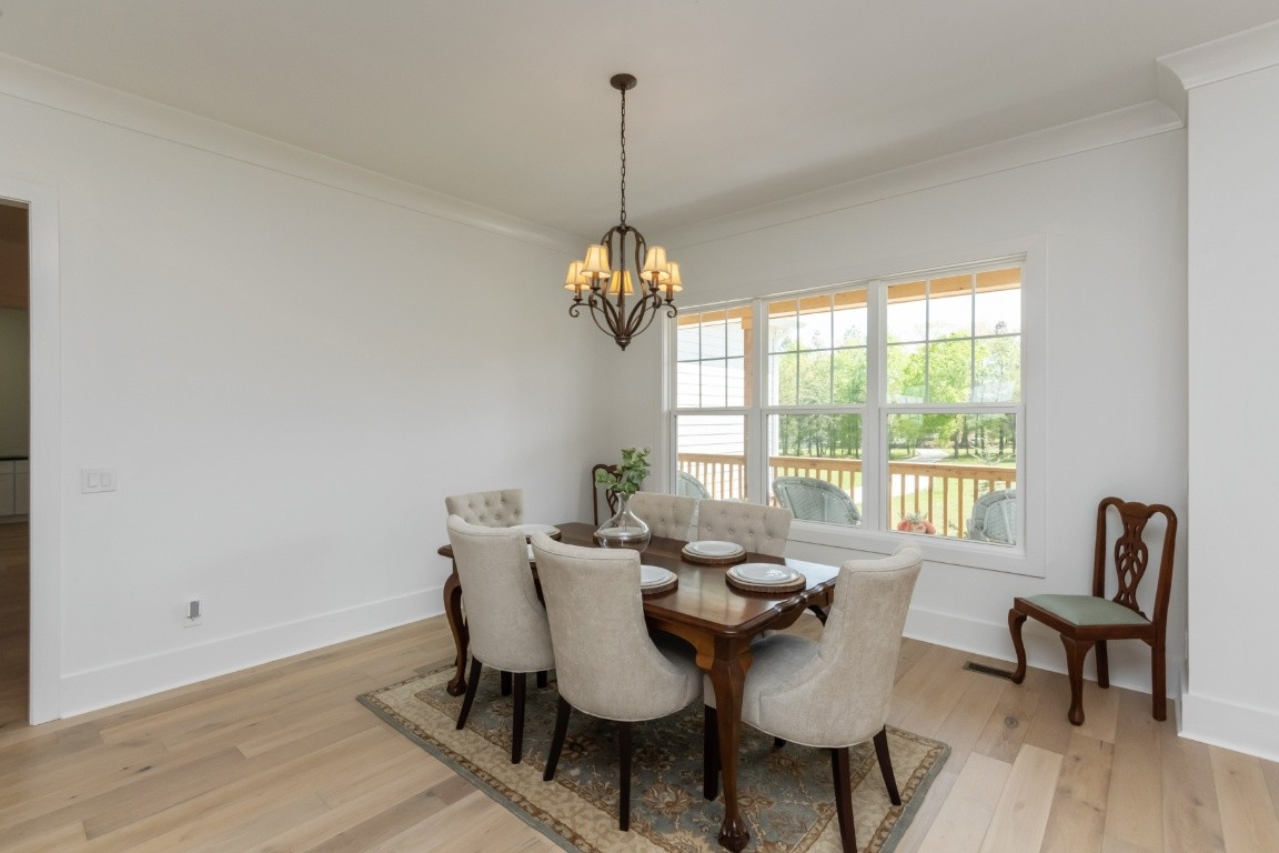 6926 Cairo Bend Road Lebanon, TN 37087 - Photo 4 of 42 a dining room with furniture and window