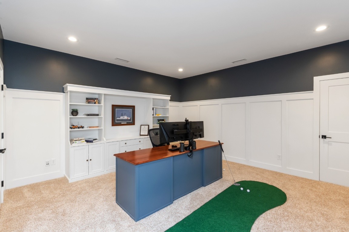 6926 Cairo Bend Road Lebanon, TN 37087 - Photo 35 of 42 a living room with furniture and a flat screen tv