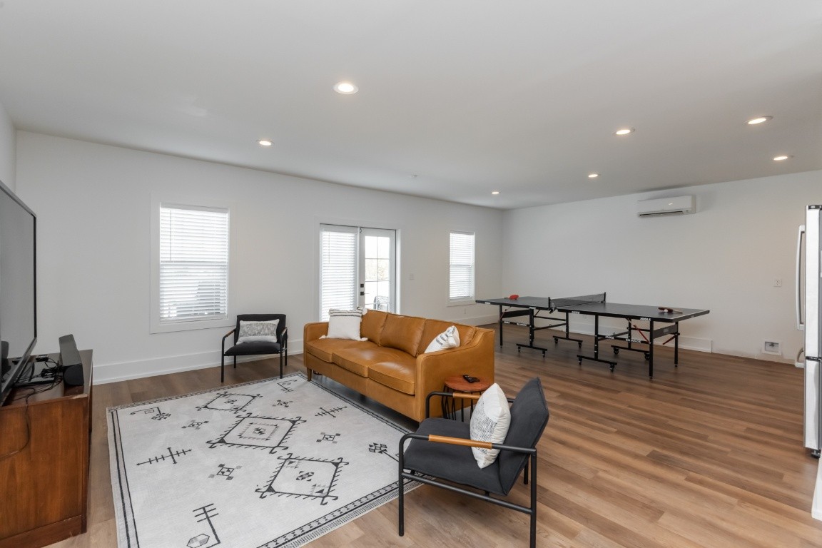 6926 Cairo Bend Road Lebanon, TN 37087 - Photo 37 of 42 a living room with furniture and wooden floor