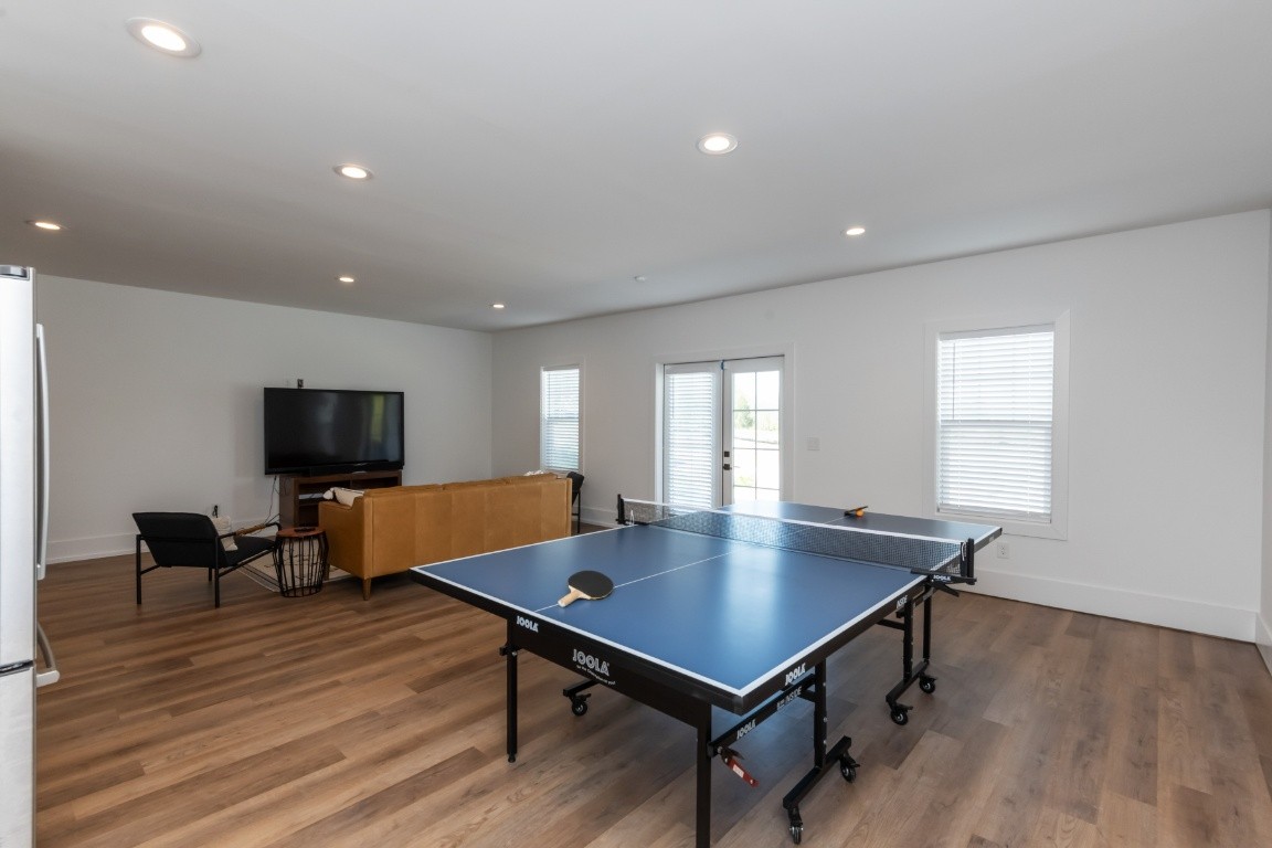 6926 Cairo Bend Road Lebanon, TN 37087 - Photo 39 of 42 a living room with table tennis table and a window