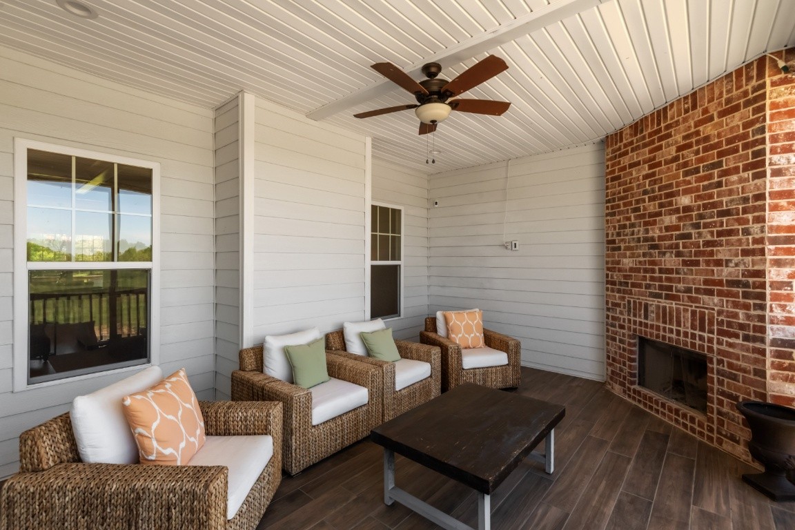 6926 Cairo Bend Road Lebanon, TN 37087 - Photo 42 of 42 a outdoor living space with patio furniture and a fireplace