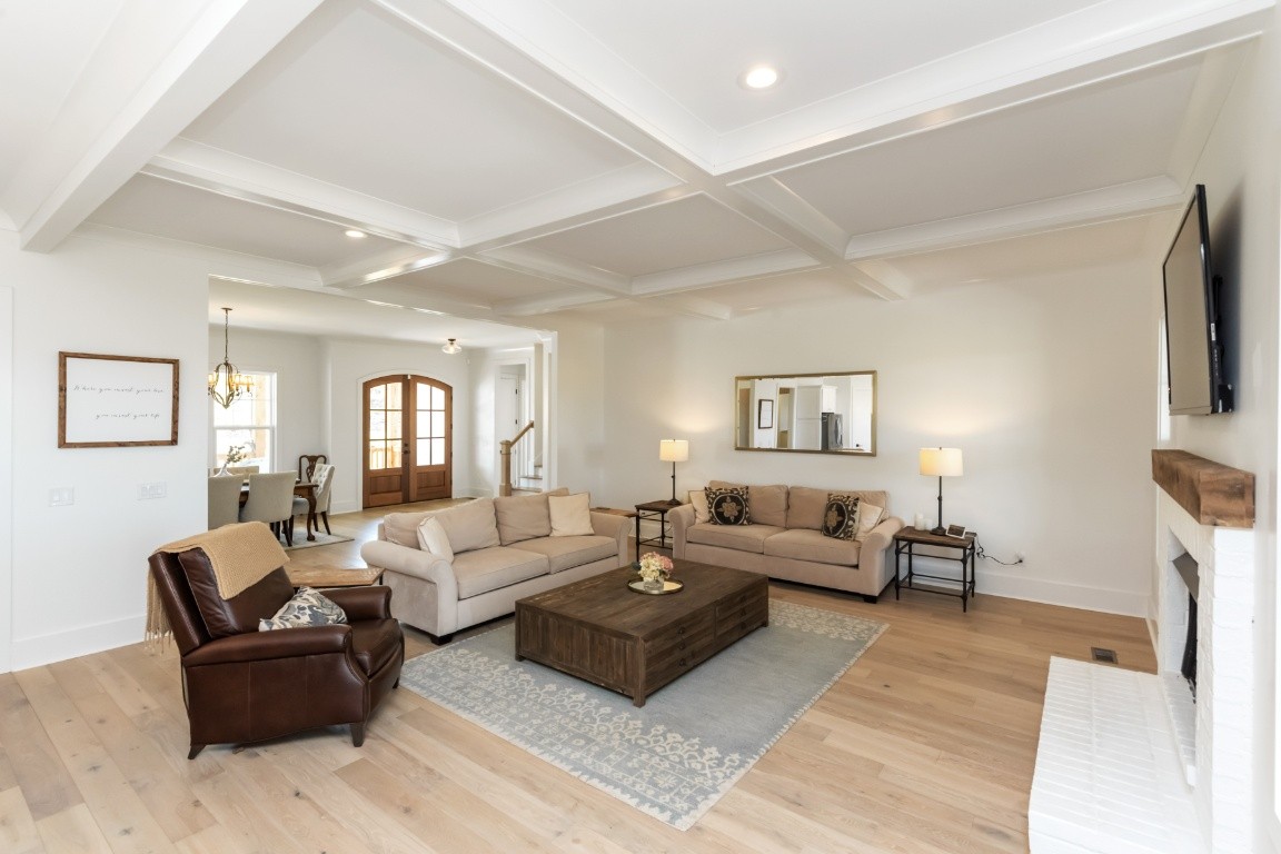 6926 Cairo Bend Road Lebanon, TN 37087 - Photo 7 of 42 a living room with furniture and a fireplace
