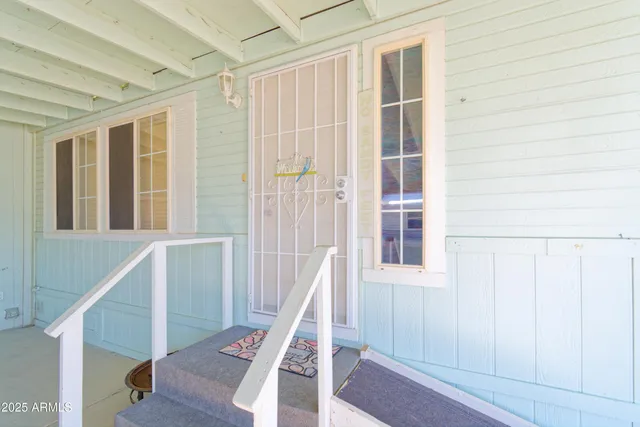 a view of an entryway with staircase