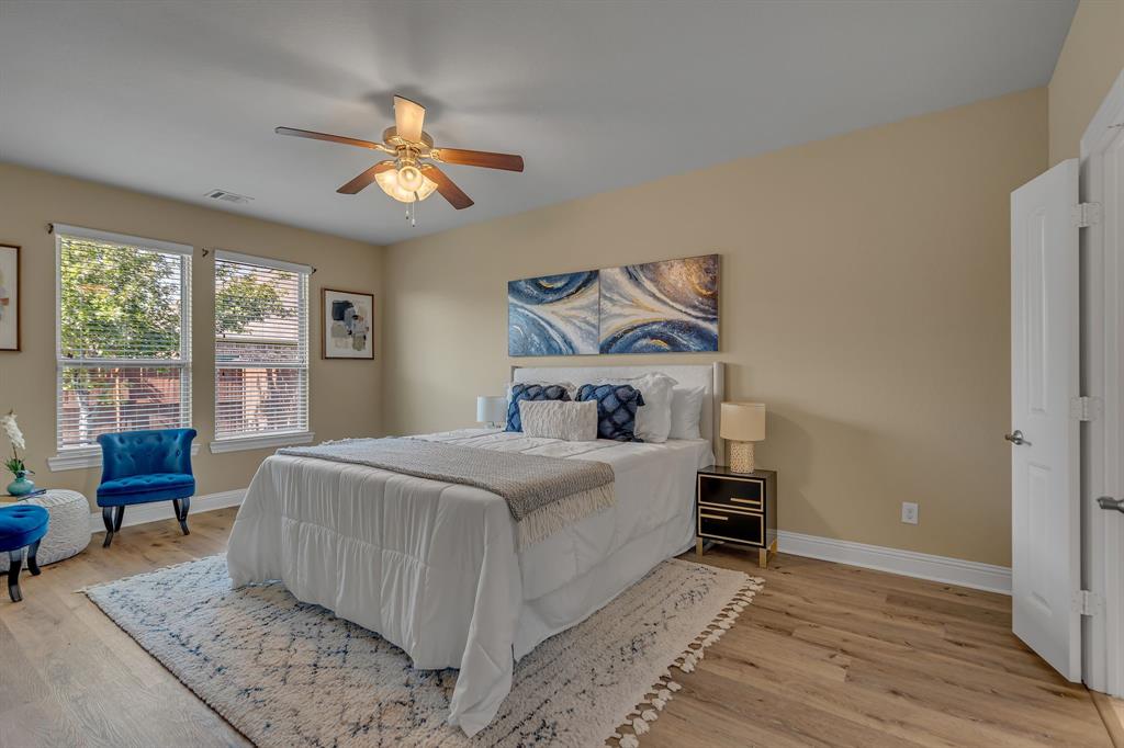 3812 Fordham Street Frisco, TX 75036 - Photo 16 of 33 a bedroom with a bed and wooden floor