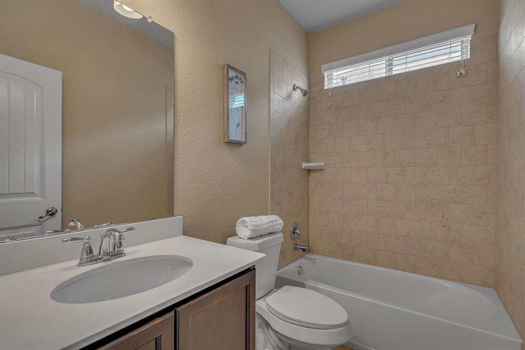 3812 Fordham Street Frisco, TX 75036 - Photo 20 of 33 a bathroom with a granite countertop sink toilet and shower