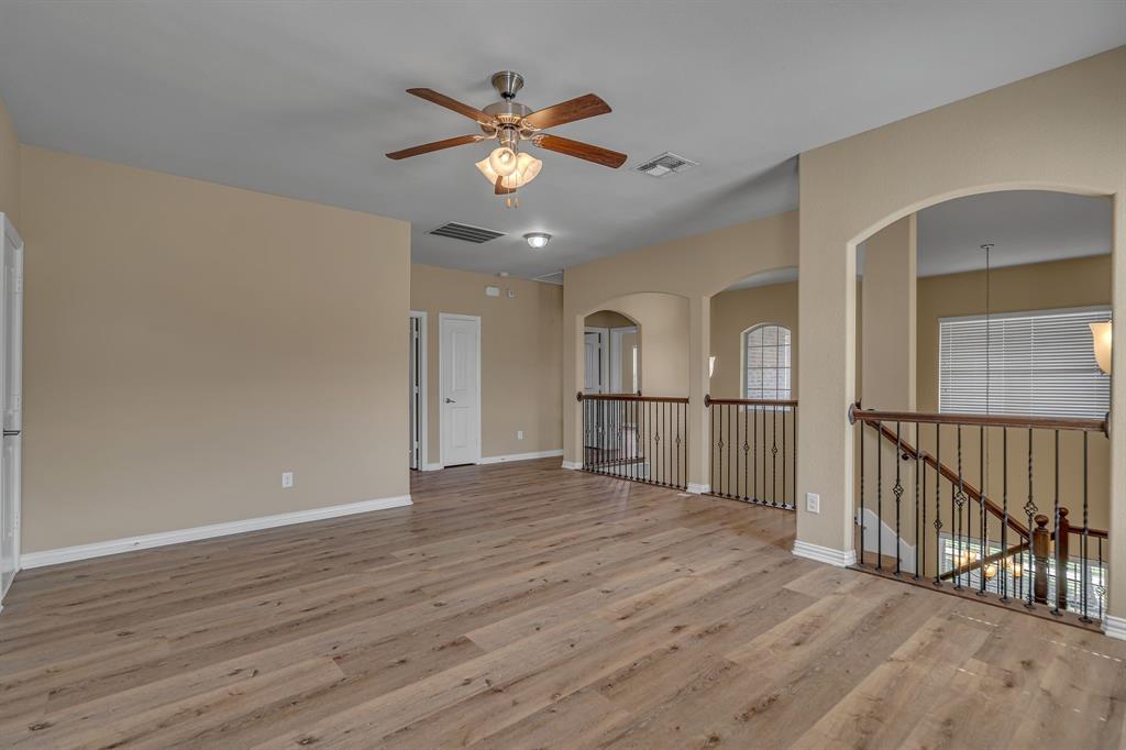 3812 Fordham Street Frisco, TX 75036 - Photo 23 of 33 a view of empty room with wooden floor