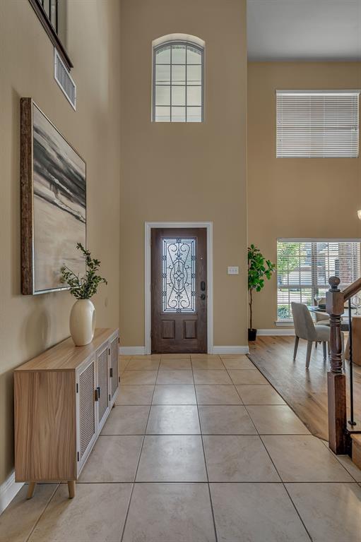 3812 Fordham Street Frisco, TX 75036 - Photo 5 of 33 a view of a hallway with furniture and a window