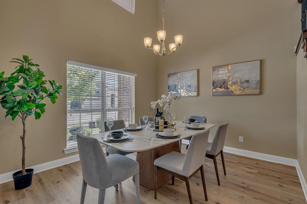 3812 Fordham Street Frisco, TX 75036 - Photo 6 of 33 a view of a dining room with furniture window and wooden floor