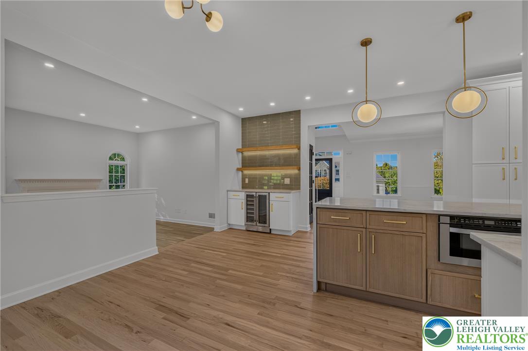 3130 Muirfield Road Center Valley, PA 18034 - Photo 18 of 63 Gleaming hardwood floors and clean plaster walls anchor this open-concept culinary space.