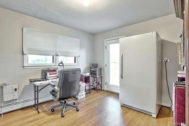 60 Brewer Road Monsey, NY 10952 - Photo 20 of 32 a view of a workspace with furniture and a window