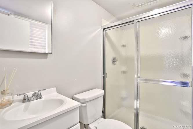 60 Brewer Road Monsey, NY 10952 - Photo 23 of 32 a bathroom with a sink toilet and shower