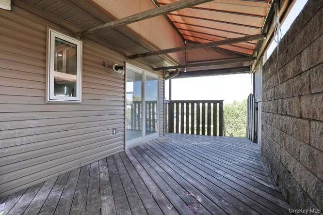60 Brewer Road Monsey, NY 10952 - Photo 30 of 32 a view of a wooden deck