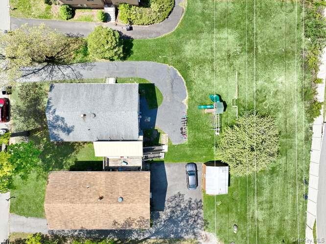 60 Brewer Road Monsey, NY 10952 - Photo 32 of 32 an aerial view of a house with a yard