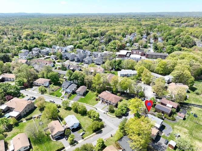 60 Brewer Road Monsey, NY 10952 - Photo 6 of 32 a view of a city with lots of flowers