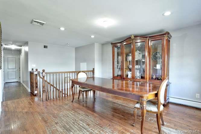60 Brewer Road Monsey, NY 10952 - Photo 8 of 32 a view of a room with furniture wooden floor and windows