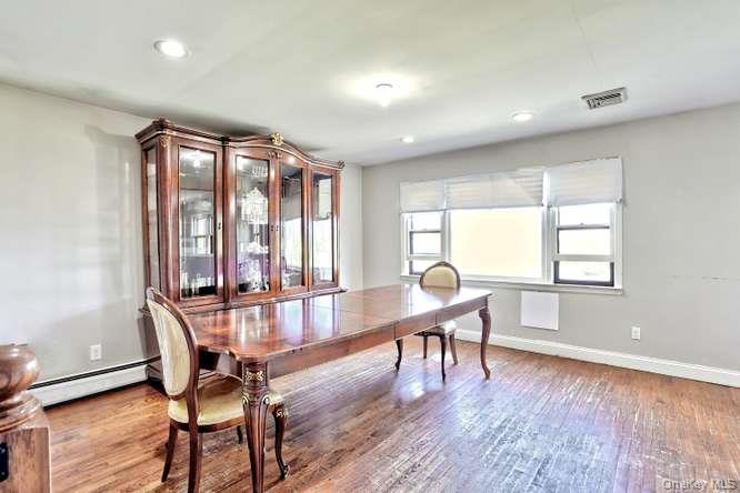 60 Brewer Road Monsey, NY 10952 - Photo 9 of 32 a view of a dining room with furniture wooden floor and chandelier