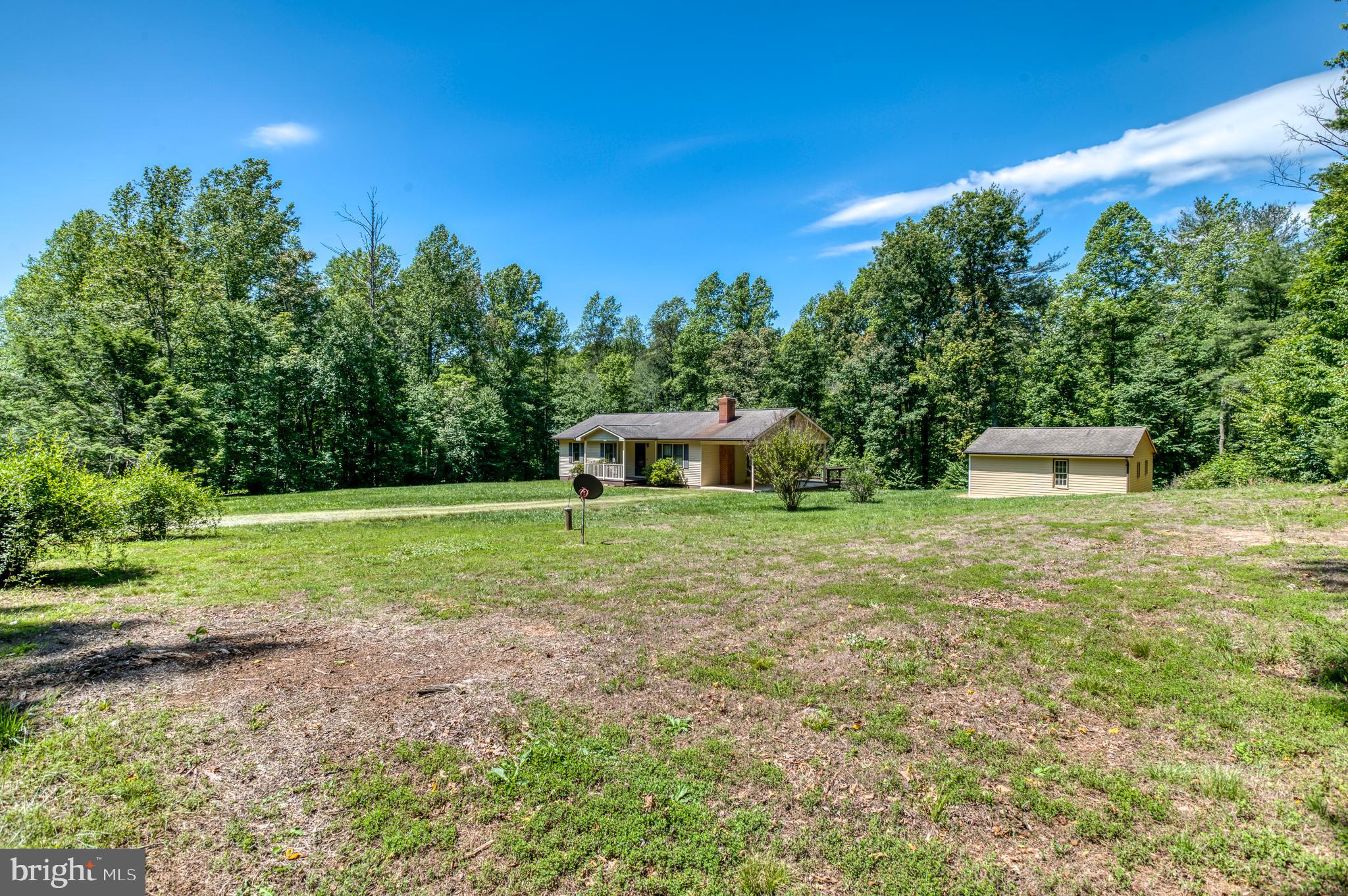 803 Weaver Hollow Road Banco, VA 22711 - Photo 29 of 67 a front view of a house with a yard