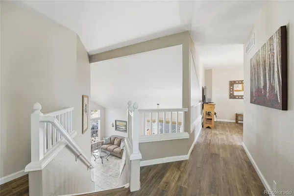 a view of livingroom with furniture and staircase